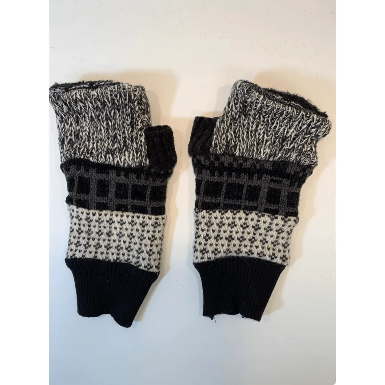 Black n white upcycled sweaters into fingerless patchwork gloves. Great for fun, school, texting, cashiers, wrist warmer,fingers free.