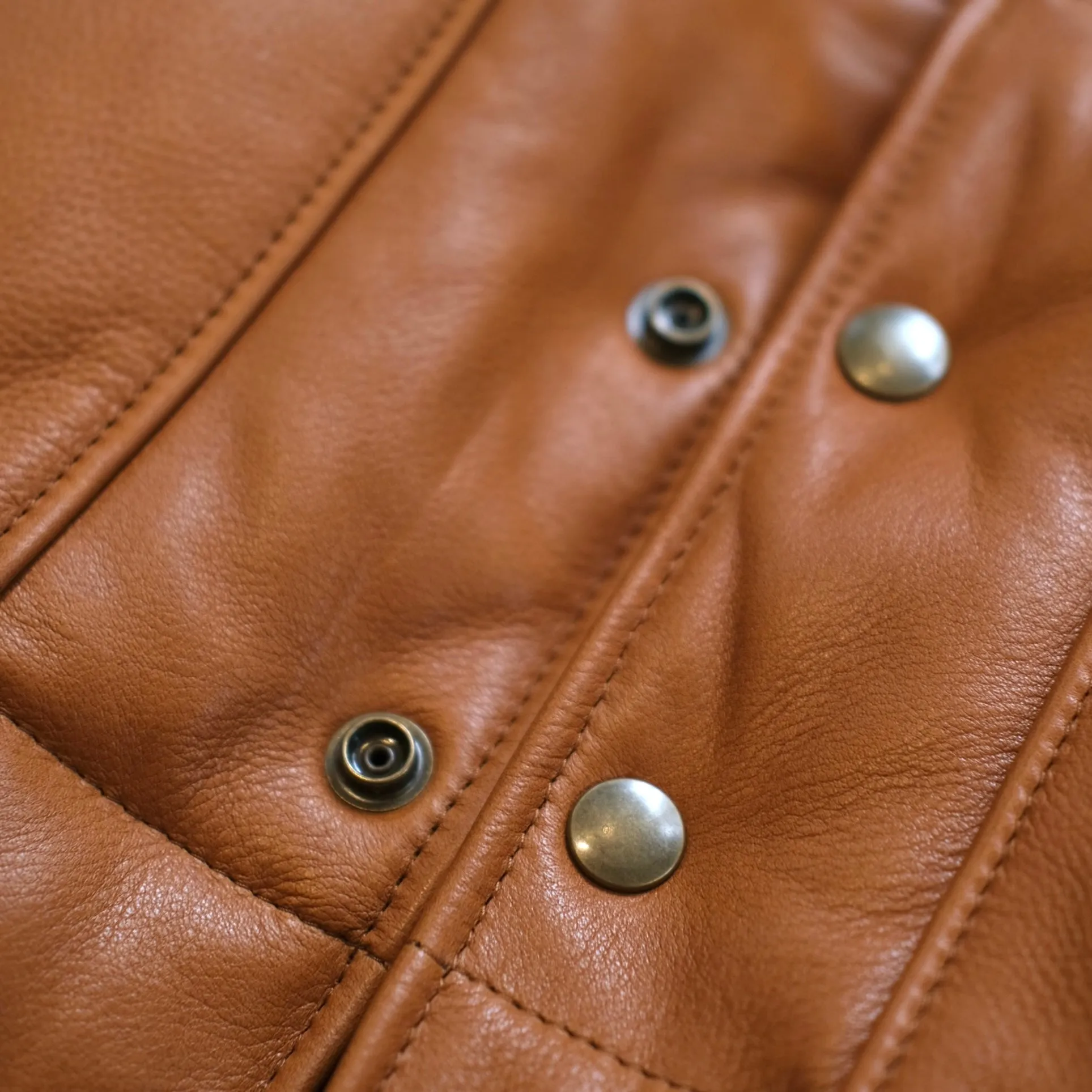 Y'2 LEATHER Steer Oil & Horsehide Down Vest